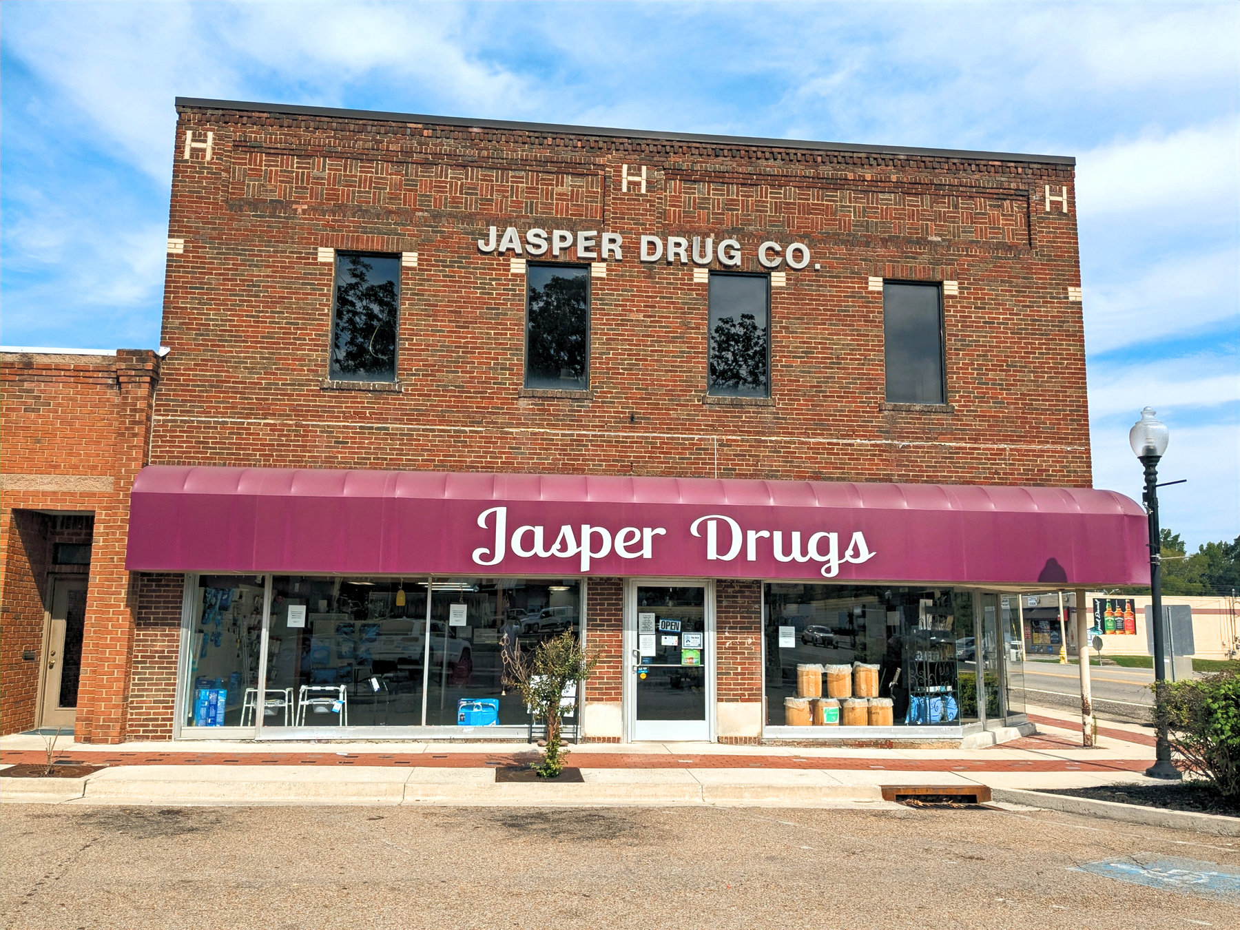 Jasper Drugs and its red awning on Courthouse Square